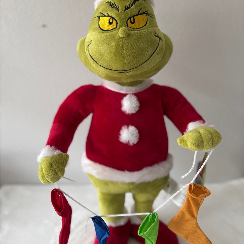The Grinch Holding Stockings Plush Greeter 19.69inch NWT.